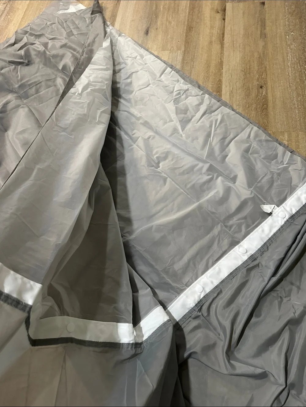 Hookless shower curtain with is a snap peva liner.  Gray sheer top